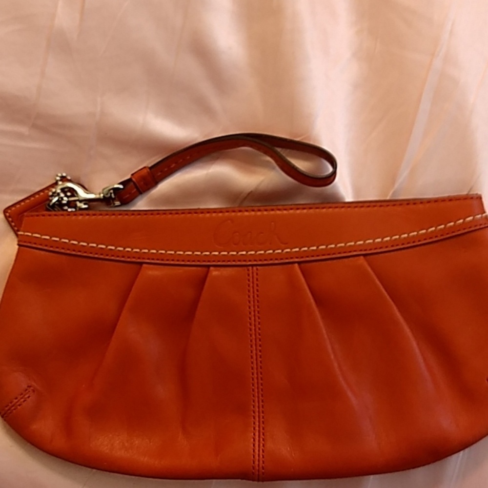 Coach oversized clutch wristlet burnt orange 13734
